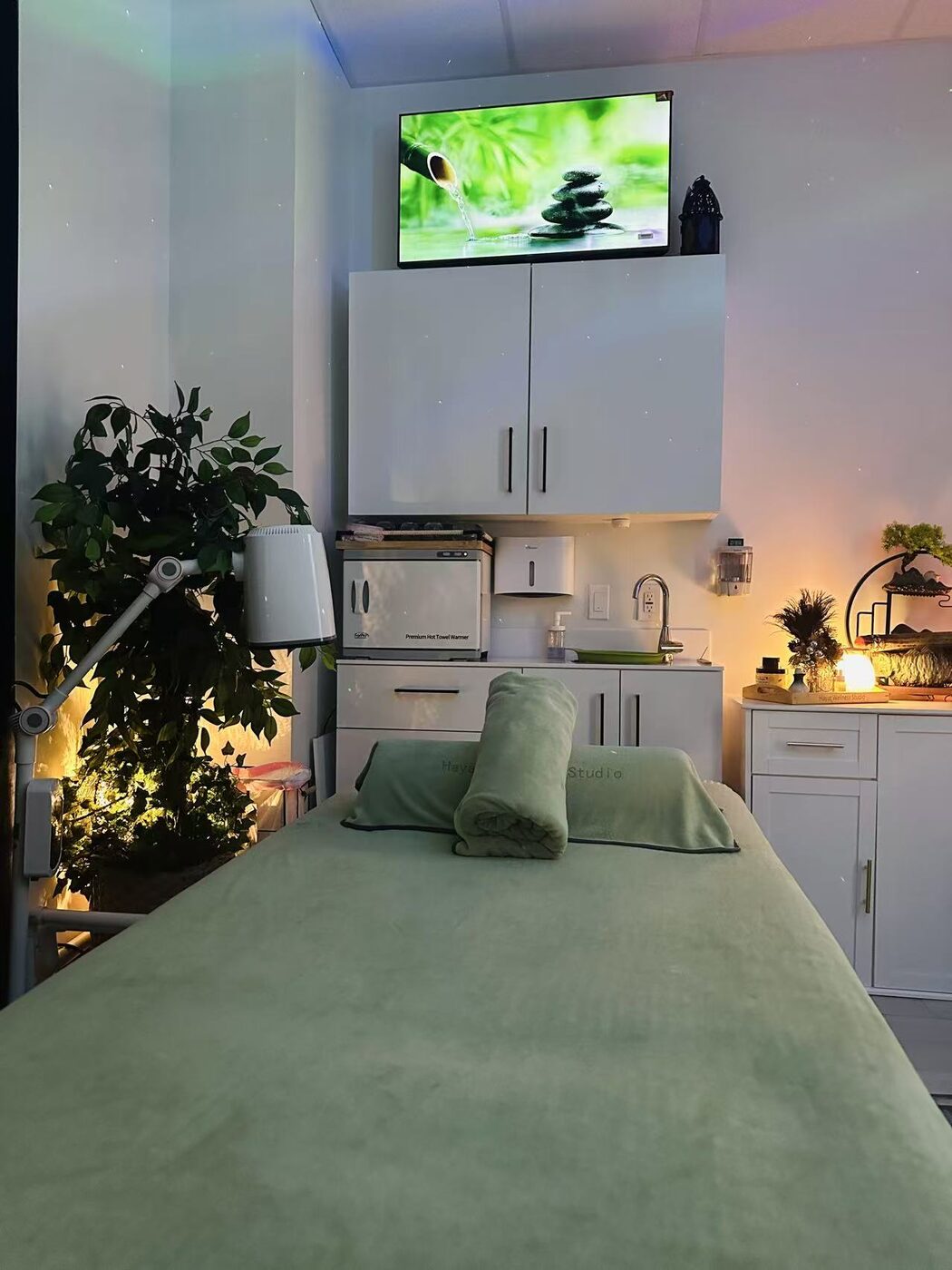 Our sage-green treatment room
